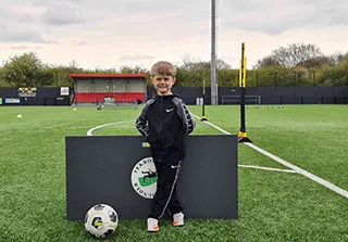 boy with nike kit