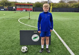 boy with blue kit