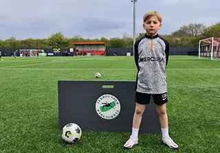 boy with grey and black top
