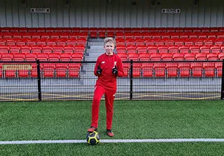 boy with red tracksuit
