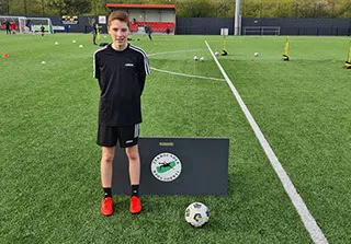 boy with black kit