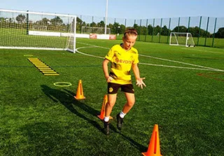 running in and out of cones